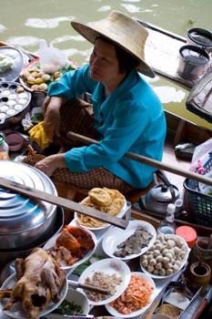 This photo of a floating food vendor in Bangkok was taken by photographer Steve Knight from Ashurstwood, West Sussex in England.